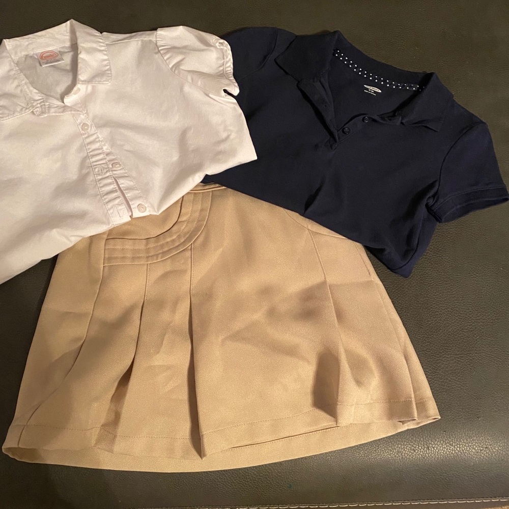 Uniform bundle-2 shirts and a skirt.